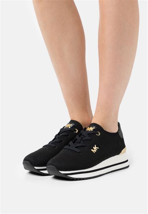 michael kors monique trainer black|monique trainer sneakers.